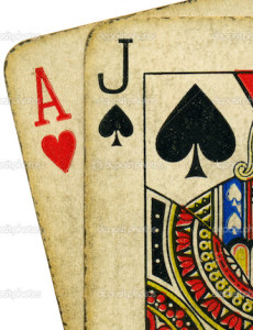 Close up of vintage dirty blackjack cards.